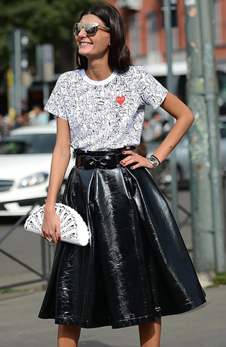 Women's Silver Watch, White Leather Clutch, Black Pleated Leather Midi Skirt, White and Black Print Crew-neck T-shirt