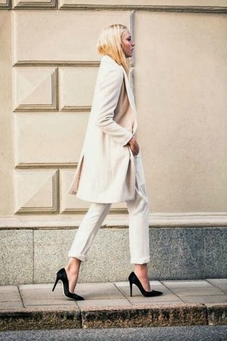 White Jeans Outfits For Women: A white coat and white jeans are among those game-changing items that can revolutionize your closet. Let your sartorial savvy truly shine by finishing off this look with black suede pumps.