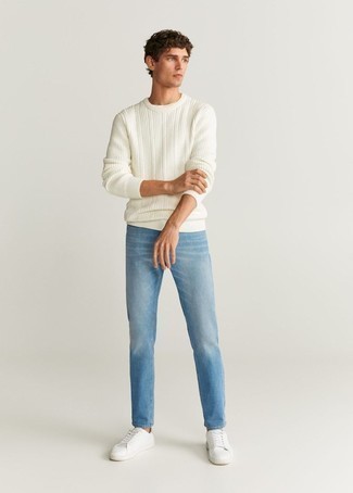 White Crew-neck Sweater Outfits For Men: The formula for off-duty style? A white crew-neck sweater with light blue jeans. A pair of white canvas low top sneakers is a great option to round off your ensemble.