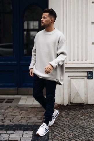 White Crew-neck Sweater Outfits For Men: Wear a white crew-neck sweater with navy chinos for a practical ensemble that's also put together. Puzzled as to how to finish? Complement this ensemble with white and navy athletic shoes to mix things up a bit.