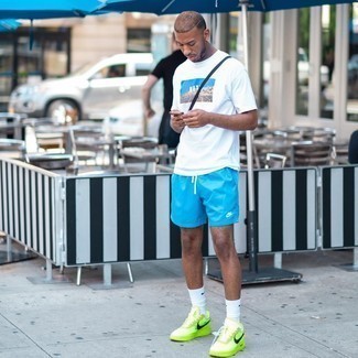 Yellow Low Top Sneakers Outfits For Men: For an ensemble that's very easy but can be flaunted in a myriad of different ways, reach for a white print crew-neck t-shirt and aquamarine sports shorts. A pair of yellow low top sneakers easily dials up the classy factor of your getup.