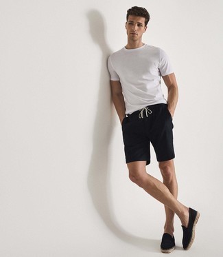 Black Shorts Outfits For Men: If it's comfort and practicality that you're seeking in an outfit, try teaming a white crew-neck t-shirt with black shorts. Introduce a pair of black canvas loafers to the mix to easily turn up the style factor of your look.