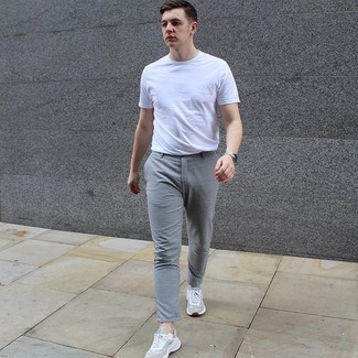 White Crew-neck T-shirt with Charcoal Check Chinos Outfits: Try teaming a white crew-neck t-shirt with charcoal check chinos for relaxed dressing with a fashionable spin. To introduce an air of stylish effortlessness to your outfit, throw grey athletic shoes into the mix.