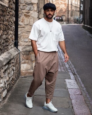 Blue Flat Cap Outfits For Men: Who said you can't make a fashionable statement with a street style getup? You can do so with ease in a white crew-neck t-shirt and a blue flat cap. Here's how to play it up: white athletic shoes.