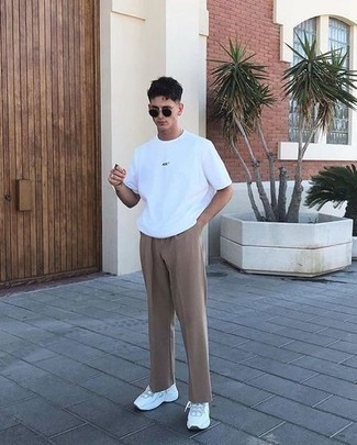 White Athletic Shoes Outfits For Men: If you would like take your casual game up a notch, opt for a white crew-neck t-shirt and khaki chinos. Dial up the wow factor of this look by slipping into white athletic shoes.