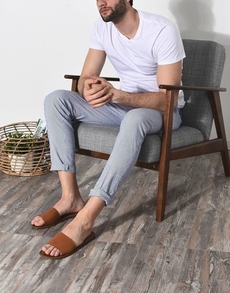 Dark Brown Leather Sandals Outfits For Men: A white crew-neck t-shirt and light blue chinos are the kind of a tested casual outfit that you so awfully need when you have no extra time. Puzzled as to how to finish off? Complement your getup with a pair of dark brown leather sandals for a more relaxed aesthetic.