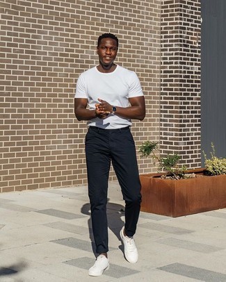 Navy Chinos with Low Top Sneakers Casual Outfits: This combo of a white crew-neck t-shirt and navy chinos spells casual cool and stylish comfort. When it comes to shoes, this outfit pairs well with low top sneakers.