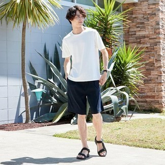 Black Sandals with Shorts Hot Weather Outfits For Men In Their 20s: For an on-trend ensemble without the need to sacrifice on functionality, we like this combo of a white crew-neck t-shirt and shorts. Complete this getup with black sandals to infuse a hint of stylish effortlessness into your look. This outfit illustrates how 20-year-old gentlemen slay in the style department.
