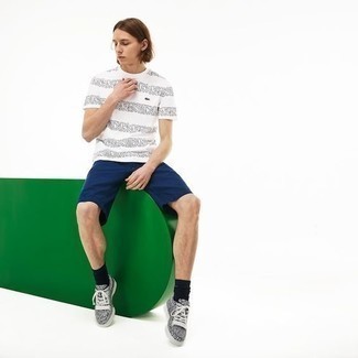 White Horizontal Striped Crew-neck T-shirt Outfits For Men: Flaunt your chops in men's fashion by putting together a white horizontal striped crew-neck t-shirt and navy shorts for a relaxed casual combo. Now all you need is a cool pair of grey print canvas low top sneakers to finish this look.