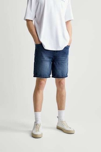 Navy Shorts Outfits For Men: If you're on the lookout for an off-duty but also on-trend ensemble, rock a white crew-neck t-shirt with navy shorts. Have some fun with things and complete your outfit with white canvas high top sneakers.