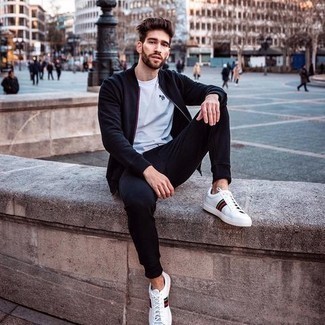 Navy Track Suit Outfits For Men: For an ensemble that's pared-down but can be worn in a multitude of different ways, pair a navy track suit with a white crew-neck t-shirt. You know how to smarten up this getup: white print leather low top sneakers.