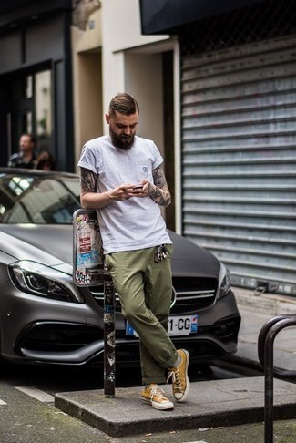 Men's White Crew-neck T-shirt, Olive Chinos, Mustard Canvas Low Top Sneakers, Grey Socks