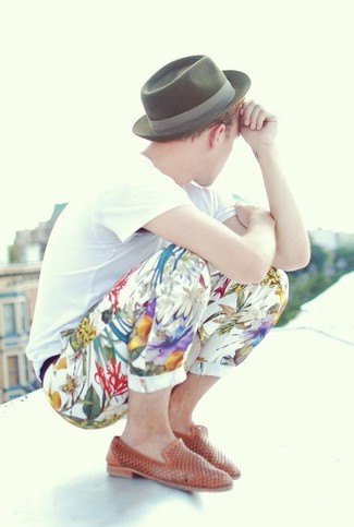 Floral Pants Outfits For Men: The pairing of a white crew-neck t-shirt and floral pants makes for a solid laid-back ensemble. If you want to immediately polish up this ensemble with one single item, complement this ensemble with tobacco leather loafers.