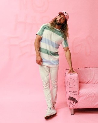 Pink Baseball Cap Outfits For Men: A white horizontal striped crew-neck t-shirt and a pink baseball cap are the ideal way to introduce some cool into your off-duty styling lineup. White canvas high top sneakers will take your ensemble down a whole other path.