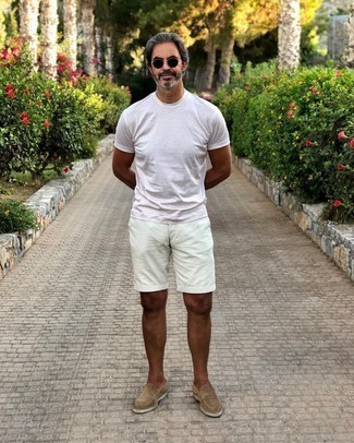 White Shorts Outfits For Men: Consider wearing a white crew-neck t-shirt and white shorts to assemble an interesting and modern-looking casual outfit. Tan suede loafers will take your outfit down a classier path.