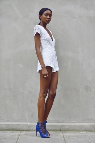 White Crochet Playsuit Outfits: Showcase that no-one does casual like you by opting for a white crochet playsuit. A pair of blue leather heeled sandals immediately bumps up the chic factor of any look.