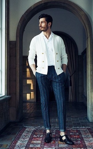 Double Breasted Cardigan Outfits For Men: This combo of a double breasted cardigan and navy vertical striped chinos will allow you to showcase your prowess in menswear styling even on lazy days. Round off this ensemble with black leather loafers to serve a little outfit-mixing magic.