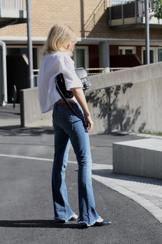 Blue Flare Jeans Outfits: Such essentials as a white dress shirt and blue flare jeans are an easy way to inject extra chic into your daily styling repertoire. Introduce a pair of black leather ballerina shoes to the equation to effortlessly kick up the style factor of your ensemble.