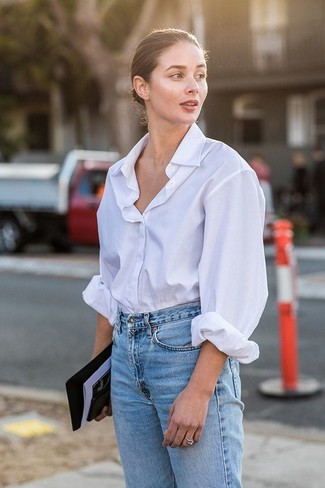 Light Blue Jeans Outfits For Women: One of our fave ways to style a white dress shirt is to wear it with light blue jeans for a casual ensemble.