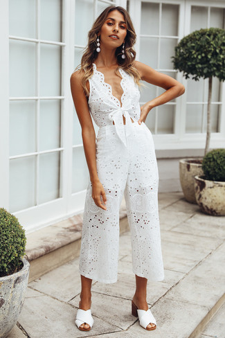 Women's Outfits 2022: When the setting allows off-duty style, reach for a white eyelet jumpsuit. And if you need to instantly smarten up this outfit with a pair of shoes, why not complete your ensemble with white leather mules?