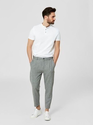 Grey Wool Chinos with White Leather Low Top Sneakers Casual Outfits: If you don't like trying too hard ensembles, pair a white henley shirt with grey wool chinos. Let your outfit coordination prowess truly shine by completing your outfit with white leather low top sneakers.