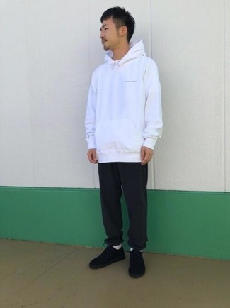 White Hoodie Outfits For Men: For a laid-back and cool ensemble, consider pairing a white hoodie with black sweatpants — these pieces play well together. Rounding off with black suede low top sneakers is a guaranteed way to give an added dose of refinement to your getup.