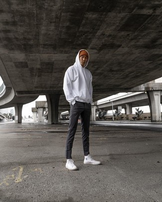 Tobacco Beanie Outfits For Men: This pairing of a white hoodie and a tobacco beanie is proof that a straightforward off-duty ensemble doesn't have to be boring. Inject your ensemble with a dash of polish by slipping into a pair of white canvas high top sneakers.
