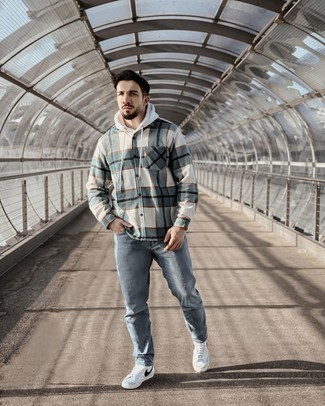 Olive Plaid Flannel Long Sleeve Shirt Outfits For Men: This relaxed casual combination of an olive plaid flannel long sleeve shirt and blue jeans couldn't possibly come across other than outrageously dapper. You know how to bring a more laid-back vibe to this look: white and black leather high top sneakers.