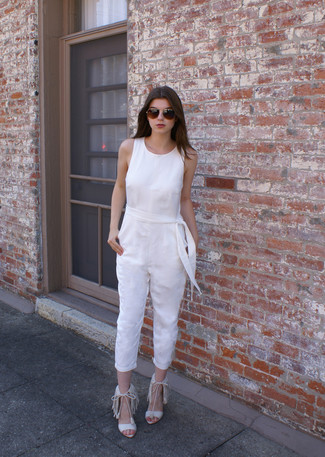 The ultimate choice for a kick-ass relaxed casual getup? A white jumpsuit. You can get a little creative on the shoe front and complement your outfit with a pair of white fringe suede heeled sandals.
