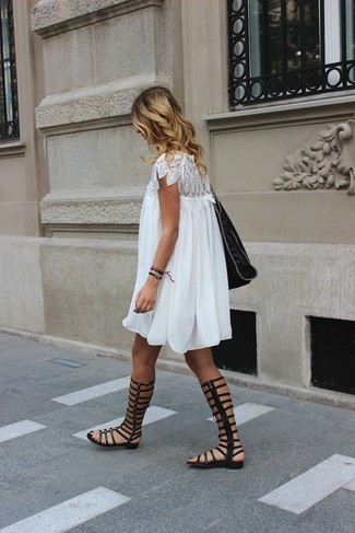 White Lace Swing Dress Outfits: Swing into something comfy yet modern with a white lace swing dress. To give your overall outfit a more relaxed finish, complement this ensemble with black leather knee high gladiator sandals.