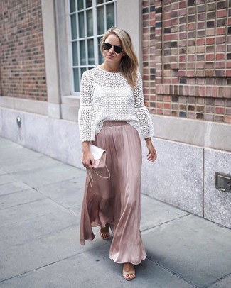 Pink Silk Maxi Skirt Outfits: Why not consider pairing a white lace long sleeve blouse with a pink silk maxi skirt? These pieces are super comfortable and will look stunning combined together. If you want to immediately rev up your look with one item, add a pair of beige leather heeled sandals to the mix.