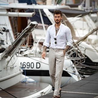 White Linen Long Sleeve Shirt Outfits For Men: A white linen long sleeve shirt and beige dress pants are among the foundations of a functional menswear collection. If you wish to easily tone down your look with a pair of shoes, why not slip into dark brown leather sandals?