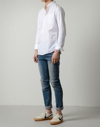 Men's White Long Sleeve Shirt, Blue Ripped Jeans, White and Navy Canvas Low Top Sneakers