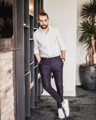 Red and Black Plaid Chinos Outfits: Marrying a white long sleeve shirt with red and black plaid chinos is a smart option for a casual getup. If you're wondering how to round off, choose a pair of white canvas low top sneakers.