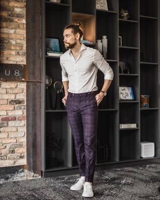 Burgundy Pants Outfits For Men: A white long sleeve shirt looks especially great when matched with burgundy pants in a relaxed look. Avoid looking too casual by finishing off with white canvas low top sneakers.