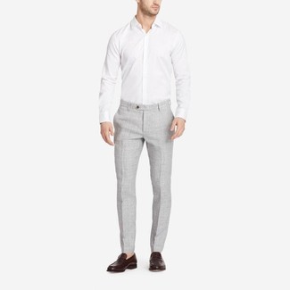 Charcoal Linen Dress Pants Outfits For Men: You'll be surprised at how easy it is to get dressed like this. Just a white long sleeve shirt and charcoal linen dress pants. Dark brown leather loafers are a savvy idea to complete your look.