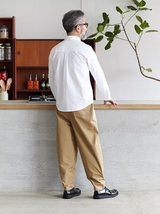 Double Monks Outfits: A white long sleeve shirt and khaki chinos are the perfect way to introduce played down dapperness into your day-to-day off-duty arsenal. For something more on the classy end to complement your getup, opt for double monks.