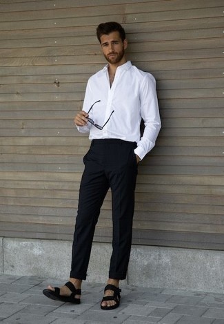 White and Navy Long Sleeve Shirt with Sandals Warm Weather Outfits For Men In Their 30s: When the situation permits a casual look, you can dress in a white and navy long sleeve shirt and navy chinos. Rock a pair of sandals to add a dash of stylish casualness to your look. Like this idea for your styling arsenal as a 30-something Millennial guy?