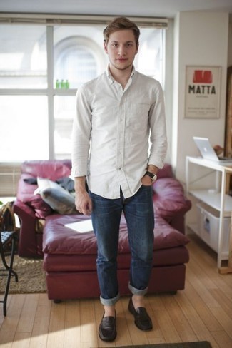 White Long Sleeve Shirt with Blue Jeans Outfits For Men: This casual combination of a white long sleeve shirt and blue jeans comes in useful when you need to look laid-back and cool in a flash. To give this getup a more sophisticated spin, introduce dark brown leather loafers to the equation.