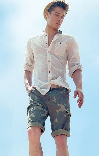 White Seersucker Long Sleeve Shirt Outfits For Men: One of the coolest ways for a man to style out a white seersucker long sleeve shirt is to marry it with olive camouflage shorts for a laid-back combination.