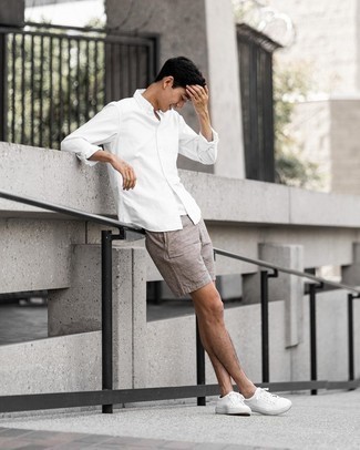 White Long Sleeve Shirt Outfits For Men: A white long sleeve shirt and brown linen shorts are great menswear essentials that will integrate really well within your daily repertoire. If you're on the fence about how to finish, a pair of white canvas low top sneakers is a good choice.