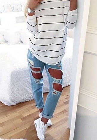 Women's White Low Top Sneakers, Light Blue Ripped Boyfriend Jeans, White and Black Horizontal Striped Oversized Sweater