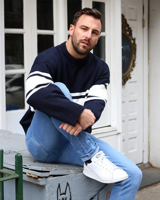 Men's Black Socks, White Leather Low Top Sneakers, Light Blue Skinny Jeans, Navy and White Horizontal Striped Crew-neck Sweater