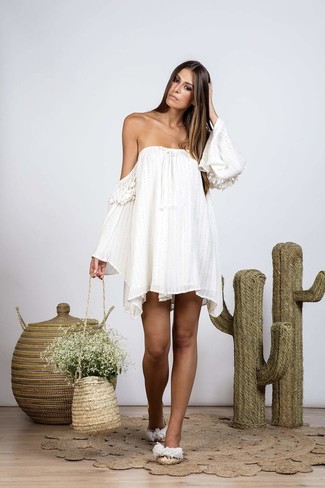 Tan Straw Bucket Bag Outfits: A white off shoulder dress and a tan straw bucket bag are a smart pairing worth having in your daily styling collection. Our favorite of an endless number of ways to finish this look is with a pair of beige straw flat sandals.