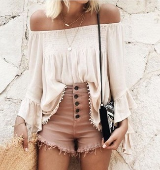 Beige Straw Hat Outfits For Women: A white off shoulder top and a beige straw hat paired together are a total eye candy for those who appreciate off-duty looks.