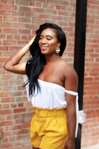 White Off Shoulder Top Outfits: A white off shoulder top and yellow shorts are the ideal way to introduce some cool into your off-duty rotation.