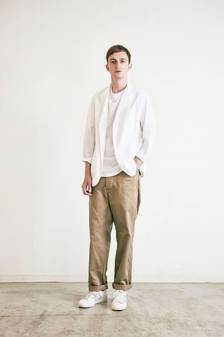 White Open Cardigan Outfits For Men: A white open cardigan and khaki chinos are a pairing that every trendsetting gent should have in his casual wardrobe. Complete this look with white leather low top sneakers for extra fashion points.