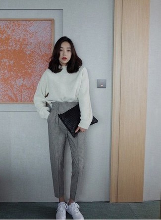 White Knit Oversized Sweater Outfits: For chic style without the need to sacrifice on practicality, we like this pairing of a white knit oversized sweater and grey dress pants. If you need to effortlessly play down your ensemble with footwear, why not introduce white low top sneakers to the mix?