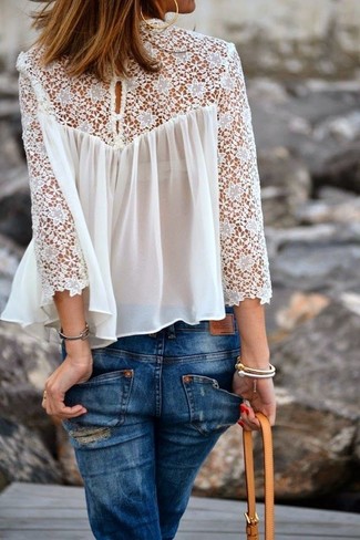 White Lace Peasant Blouse Outfits: Exhibit your expert styling in this relaxed casual combo of a white lace peasant blouse and blue jeans.