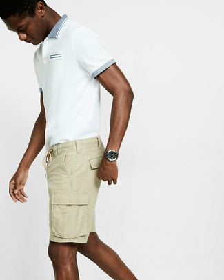 White Polo Outfits For Men: Try teaming a white polo with beige shorts for a seriously stylish, casual outfit.